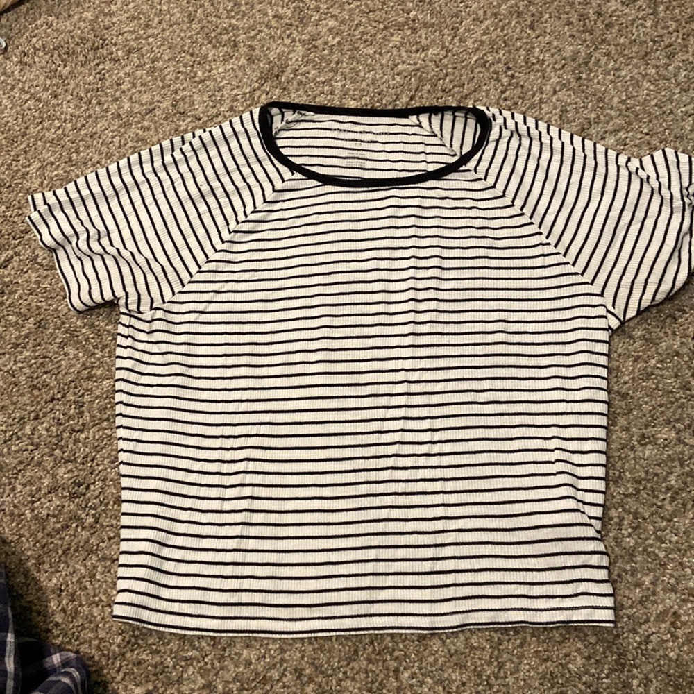 White and black shirt.